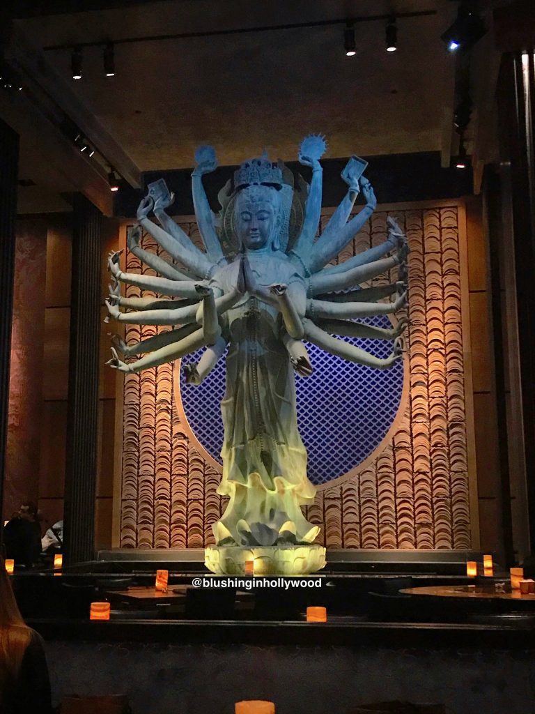 Giant Statue of Quan Yin over a Koi pond at Tao in Hollywood