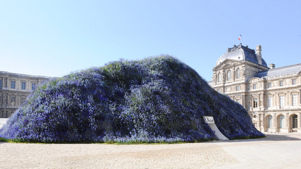 Purple flower wall Dior runway show at the Louvre Paris fashion week