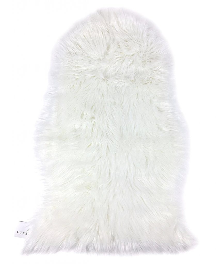 Faux sheepskin rug- I use this over my vanity seat to make it cuter.