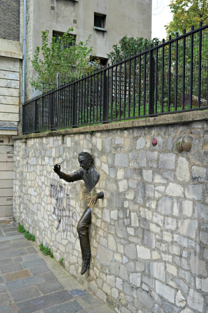 man-in-wall-paris