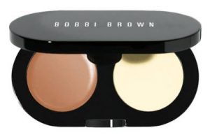 The Bobbi Brown Creamy Concealer kit comes with a creamy concealer with orange undertones that help cancel out dark under eye circles and a powder that sets the concealer in place so it lasts longer.