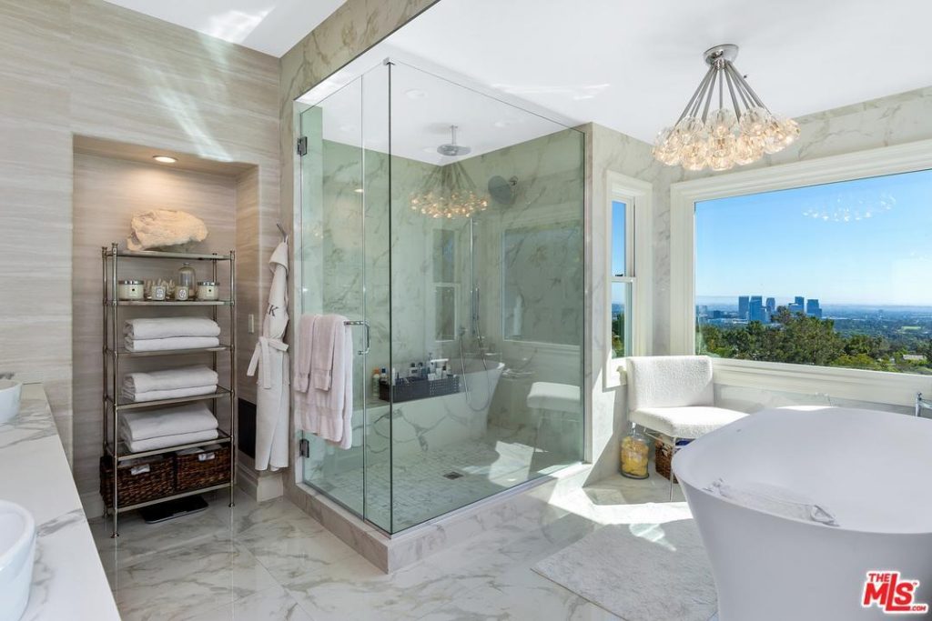 Dorit Kemsley of Real Housewives of Beverly Hills master bathroom has a gorgeous view of Los Angeles, but no home hair salon.