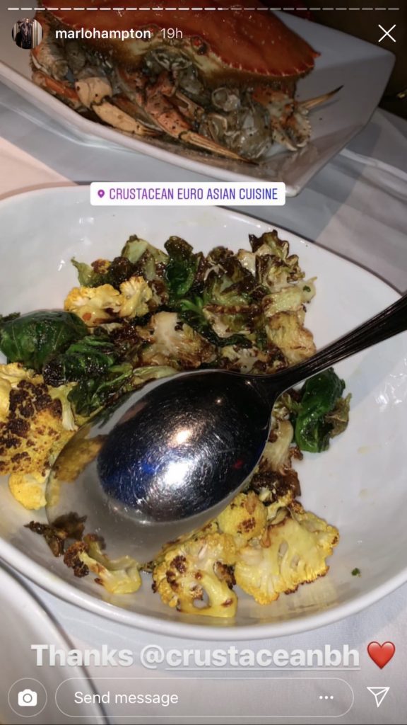 Marlo Hampton eating at Crustacean Beverly Hills Restaurant