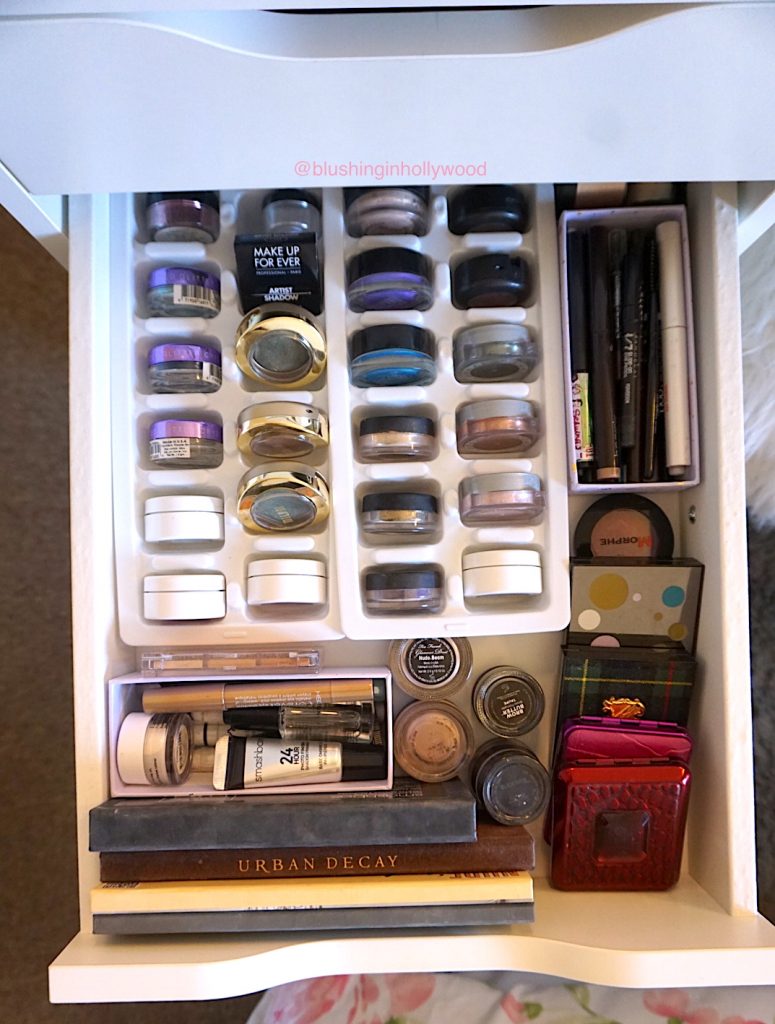 My Ikea Alex eyeshadow drawer- I used ice cube trays from the Dollar Store to store all of my single eyeshadows.